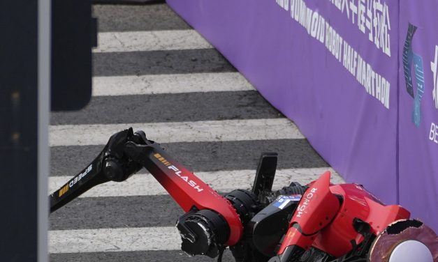 A humanoid robot sprints past the human half-marathon world record in Beijing race
