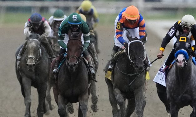 Napoleon Solo holds off Iron Honor to win the Preakness