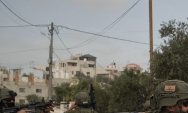 Israeli settlers beat Palestinians and a U.S. photojournalist in West Bank attacks